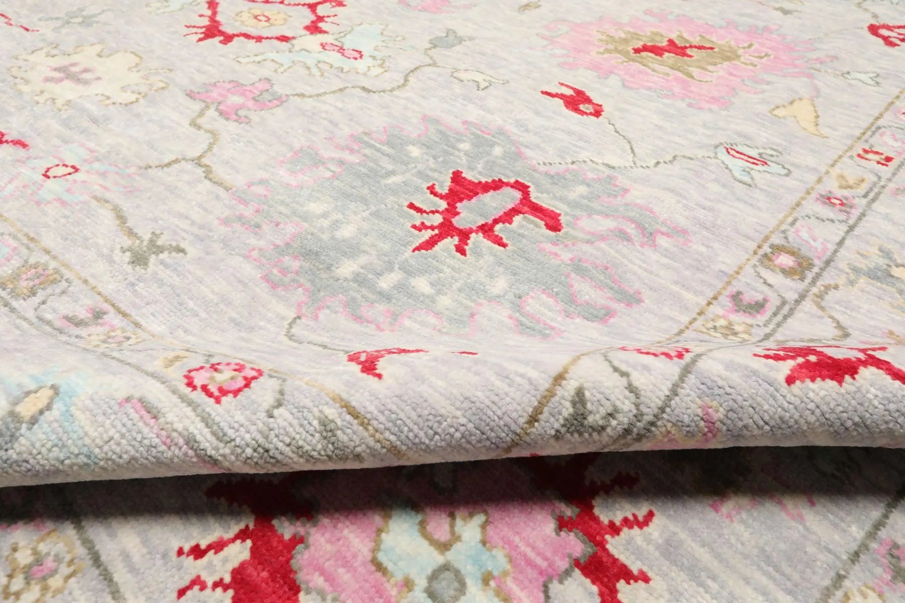 Low Pile Turkish Hand-Knotted Oushak Area Rug – Soft Lavender-Gray Background with Red, Pink, and Aqua Accents – 100% Wool, 6x9 ft
